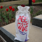 Page 9 "None of us Drink..." Wine Bag